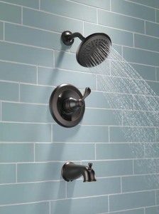 lot 102 image: Delta Porter Collection Single-Handle 3-Spray Tub and Shower Faucet in Oil Rubbed Bronze (Valve Included)