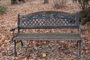 lot 56 image: Patio Furniture Wrought Iron Treated Wood Bench