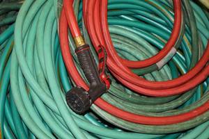 lot 115 image: Garden Hoses and Nozzle Sprayers...