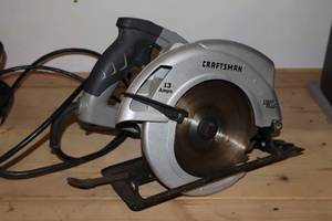 lot 99 image: Garage ShopCraftsman 7 14 Circular Saw 320.10871 Laser Trac Work Light Corded 13 amps(T)