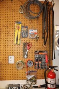 lot 45 image: Garage Shop Workbench...Ratchet Straps, Cable Rope wHooks, Bungy Cords Etc