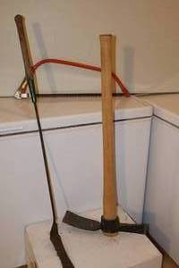 lot 31 image: Vintage Pick Ax, Hand Weed Wacker. Hand Saw
