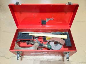 lot 115 image: Vintage Milwaukee Heavy-Duty Case with Misc. Wood Working Accessories