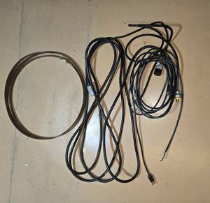 lot 126 image: Two Heavy Duty Extension Cords and Metal Wire Reel