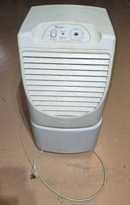 lot 128 image: Whirlpool Portable Dehumidifier with Adjustable Settings