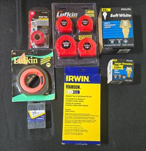 lot 136 image: Lot of Lufkin Measuring Tapes, Irwin Die Set, and Philips Bulbs