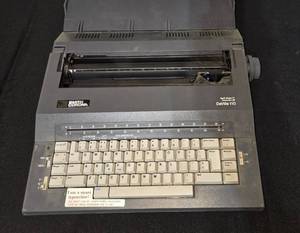 lot 306 image: Smith Corona DeVille 110 Smart Typewriter with Spell-Right I Dictionary - untested