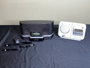 lot 179 image: Sirius Satellite Radio Docking Station with White Alarm Clock Radio