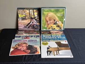 lot 183 image: Lot of Vintage Vinyl Records Including Moon River and Merry Christmas