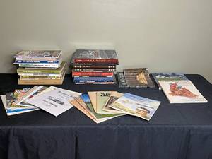 lot 189 image: Collection of Vintage and Instructional Books on Cars, Logging, and More