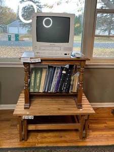 lot 200 image: Vintage Wooden End Table with 15 Television and Collection of Books. Additional Wooden Platform Inc.