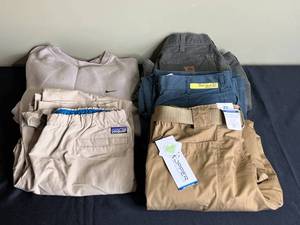 lot 285 image: Mixed Lot of Mens Apparel Brand Name T-Shirts and Pants (Size XL & 38x30) - some new w tags