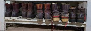 lot 413 image: Collection of 8 Pairs of Used Winter Boots from Various Brands
