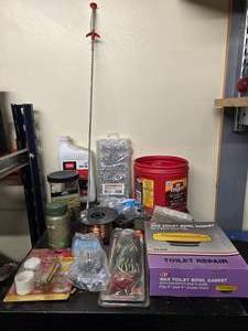 lot 454 image: Lot of Hardware Supplies and Toilet Repair Items including Bolts, Gasket, and More