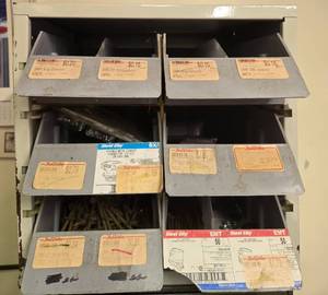 lot 481 image: Lot of Assorted Fasteners, Screws, and Washers in Storage Bin