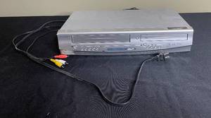 lot 246 image: Sylvania Video Cassette Recorder and DVD Player (Model DVC841G) - untested