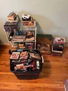 lot 247 image: Large Lot of Assorted DVDs, Books and Metal Wire Rack