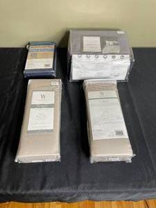 lot 262 image: Lot of Bedding Essentials Wamsutta 525 Twin Fitted Sheet, Heartland 400 Thread Count Pillowcases, Fairfield Square 1400 Thread Count Queen Sheet Set