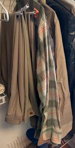 lot 276 image: Mixed Lot of Mens Clothing Including Shirts, Pants, and Jackets