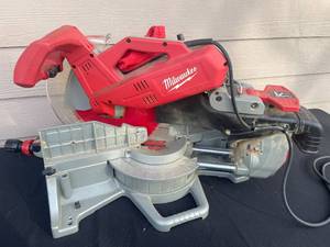 lot 10 image: Milwaukee 12 Sliding Compound Miter Saw Model 6955-20