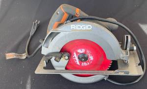 lot 19 image: RIDGID R3205 7-14 Inch Circular Saw with 15 Amp Motor