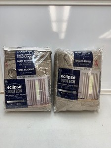 lot 158 image: 2 New Open Box 2 Packs (4 Curtains Total) of Eclipse Total Blackout Curtains, All Panels are 52 x 84 - Maddox Ivory