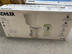 lot 31 image: Kohler Intrepid The Complete Solution Two-Piece Elongated Toilet, 1.28 gpf With Quiet Close Seat