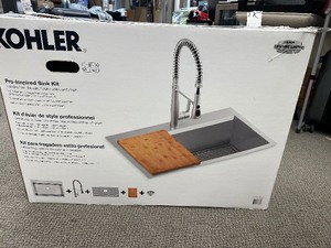 lot 267 image: Kohler Pro-Inspired Stainless Steel Kitchen Sink Kit With Sink, Bamboo Cutting Board, Silicone Mat, Drain Strainer & Hardware - Does Not Include Faucet