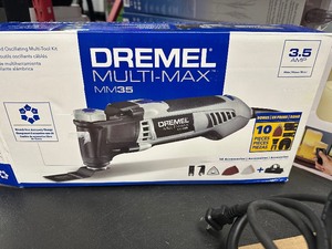 lot 266 image: Dremel Multi-Max MM35-02 3.5 Amp Variable Speed Corded Oscillating Multi Tool Kit with 8 Accessories and Storage Bag - Ideal for Metal & Wood Cutting, Grout Removal, and Sanding Applications