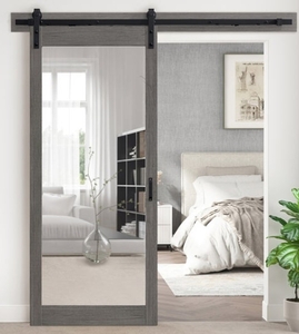 lot 224 image: OVE Decors Brittnay Mirrored Barn Door - Textured Carbon Gray Retail $499.99 - Broken Mirror - Not Sure if Has Hardware