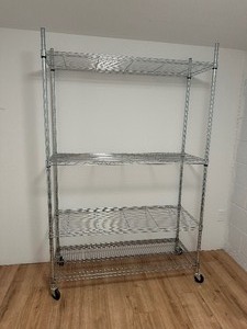 lot 128 image: Wire Shelf With Wheels 4FT W X 75 inch H X 18INCH