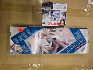 lot 21 image: Lot of Logan Do-it-Yourself Mat Cutting Kit and Pentax Optio S7 Digital Camera ( All new in packs)