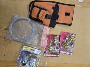 lot 35 image: Lot of 5 items (2 plastic Wheels, one 50ft Guidewire, 1 Pitbull tool storage, and 1 Valley bearing Protector )