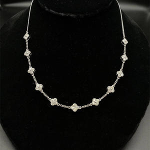 lot 32 image: 3.12 Carat Diamond Van Cleef Style Four-Leaf Petal Clover Station Necklace