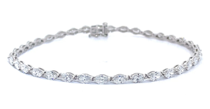 lot 9 image: Sparkling 6 Carat Oval Diamond Tennis Bracelet in 14k White Gold VIDEO
