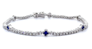 lot 46 image: 2.50 Carat Diamond & Blue Enamel Flower Cross Station Tennis Bracelet