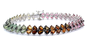 lot 81 image: Colored Stone Chevron Cluster Tennis Bracelet