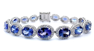 lot 26A image: Oscar Friedman 20.72 Carat Tanzanite & Natural Diamond Halo Bracelet in 14k White Gold $26,570 Appraisal Included VIDEO