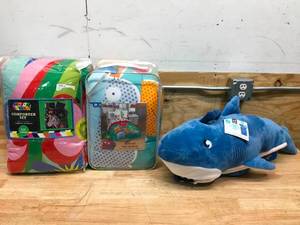 lot 138 image: Unicorn FullQueen Sized Comforter Set, Ugly Dolls Twin Comforter and Shark Sleeping Bag