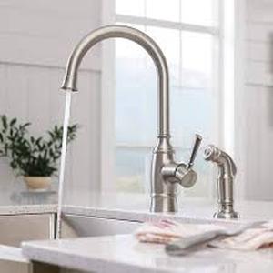 MOEN Noell Single-Handle Standard Kitchen Faucet with Side Sprayer in Spot Resist Stainless  Customer Returns See Pictures