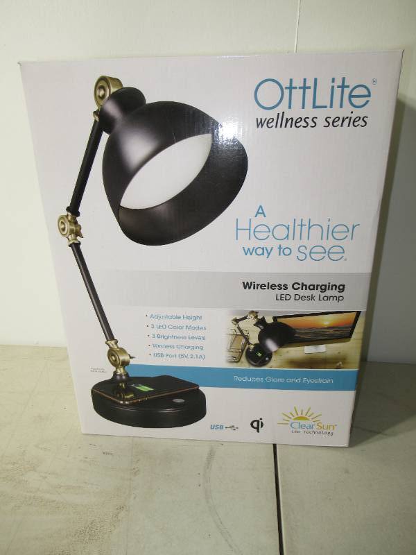 lot 98 image: OttLite LED Table Lamp with Wireless Charging Base LED Table Lamp with Wireless Charging Base.