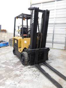 lot 9 image: 1999 Nissan E6000 48 Volt Electric Forklift