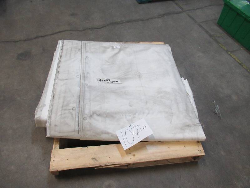 lot 107 image: NEW Vinyl Tarp - 40 x 44  White Vinyl tarp - 20 oz. Heavyweight Heavy Duty With Grommets