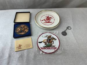 lot 8 image: Winchester Ashtray , Medallion, Keychain, and Patch
