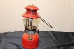 lot 119 image: Coleman Vintage Red Lantern with Pyrex Globe