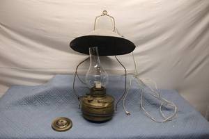 lot 147 image: Antique Brass Oil Lamp with Metal Shade and Reflector Base