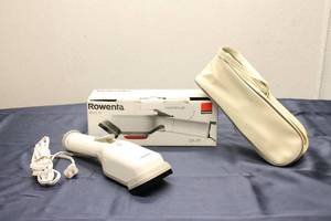 lot 265 image: Rowenta DA-55 Handheld Garment Steamer with Carrying Case