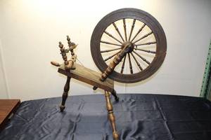 lot 309 image: Antique Wooden Spinning Wheel with Detailed Spindle