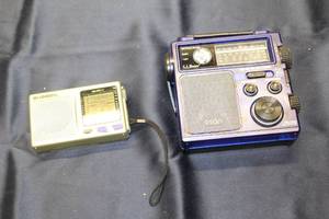 lot 329 image: Lot of 2 Portable Multi-Band Radios L.L. Bean WeatherAMFM and Bell & Howell World Receiver