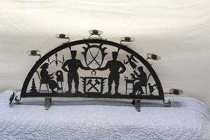 lot 348 image: Vintage Decorative Candle Holder with Intricate Silhouette Design